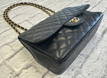 Load image into Gallery viewer, Chanel Black Caviar Jumbo Single Flap Gold Toned Hardware
