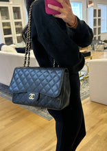 Load image into Gallery viewer, Chanel Black Caviar Jumbo Single Flap Gold Toned Hardware
