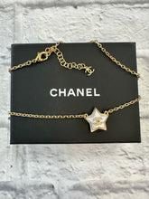 Load image into Gallery viewer, Chanel Gold and Pearlized Crystal Star Necklace
