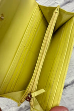 Load image into Gallery viewer, Chanel Yellow Caviar Filigree CC Flap Wallet
