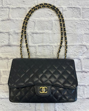 Load image into Gallery viewer, Chanel Black Caviar Jumbo Single Flap Gold Toned Hardware

