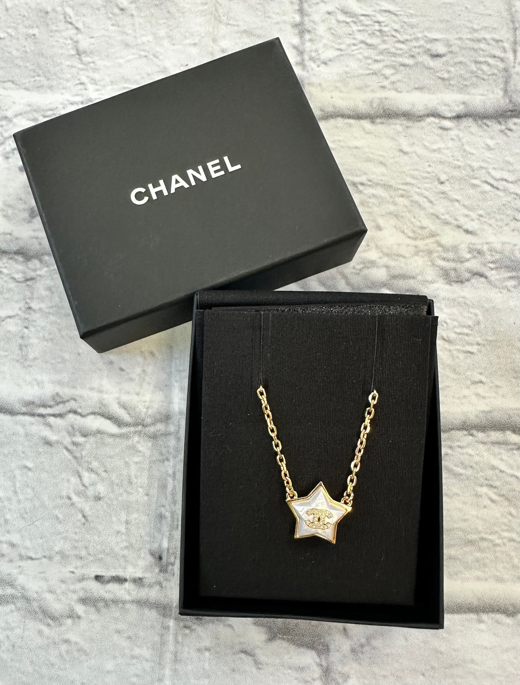 Chanel Gold and Pearlized Crystal Star Necklace