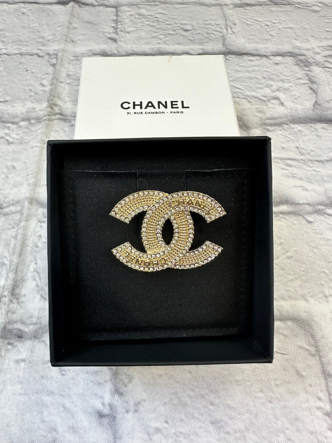 Chanel Light Gold and Crystal Logo Brooch