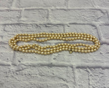 Load image into Gallery viewer, Chanel Cream Pearl Necklace
