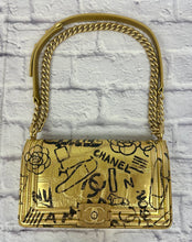 Load image into Gallery viewer, Chanel Egyptian Gold Croc Embossed Leather Graffiti Medium Boy Flap Bag
