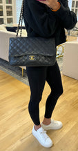 Load image into Gallery viewer, Chanel Black Caviar Jumbo Single Flap Gold Toned Hardware
